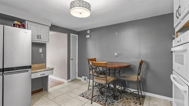341 E Mcmurray, Peters Twp, PA 15317 - dining area featuring light tile patterned floors