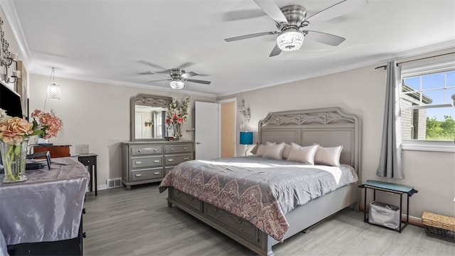 341 E Mcmurray, Peters Twp, PA 15317 - bedroom with wood finished floors, crown molding, and ceiling fan