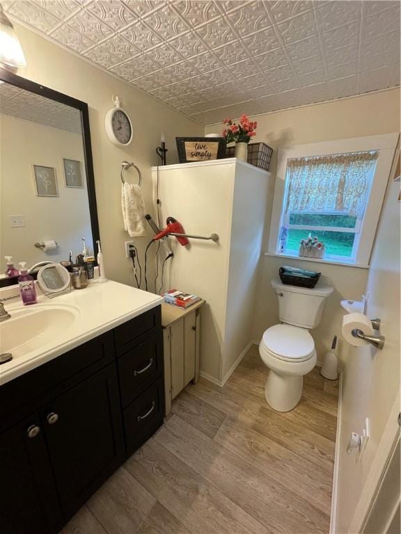 170 Laidleys Run Rd, West Finley, PA 15376 - bathroom with an ornate ceiling, wood finished floors, and vanity