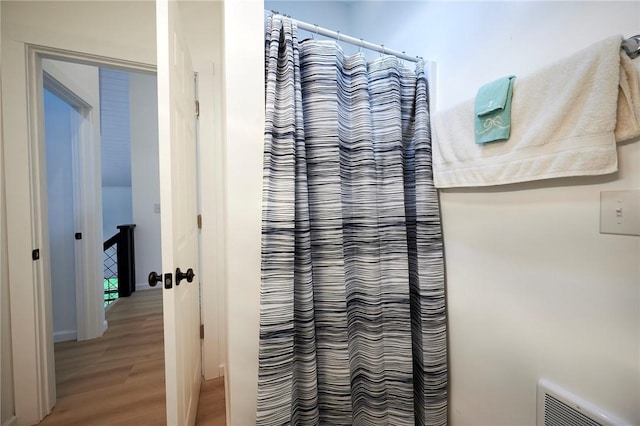214 Youngs Ln, Sugarcreek, PA 16323 - detailed view of wood finished floors and curtained shower