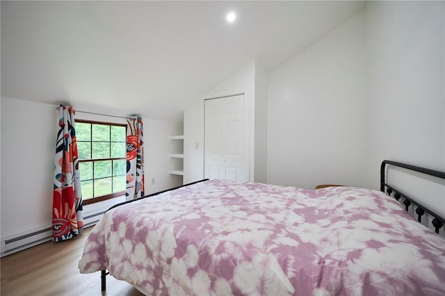 214 Youngs Ln, Sugarcreek, PA 16323 - bedroom featuring vaulted ceiling, wood finished floors, and recessed lighting