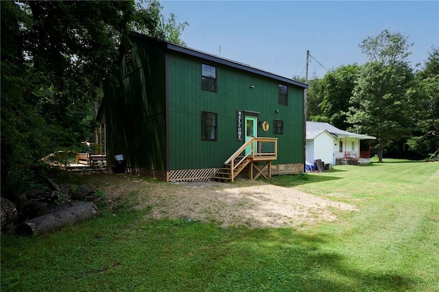 214 Youngs Ln, Sugarcreek, PA 16323 - rear view of property featuring a yard