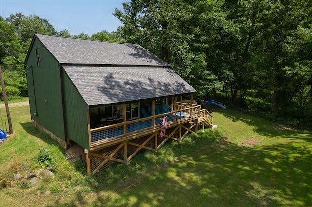 214 Youngs Ln, Sugarcreek, PA 16323 - back of house with a shingled roof and a yard