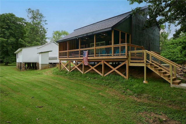 214 Youngs Ln, Sugarcreek, PA 16323 - back of property with a yard, a wooden deck, and a ceiling fan