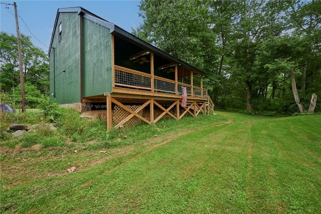 214 Youngs Ln, Sugarcreek, PA 16323 - rear view of property with a yard, a deck, and a ceiling fan