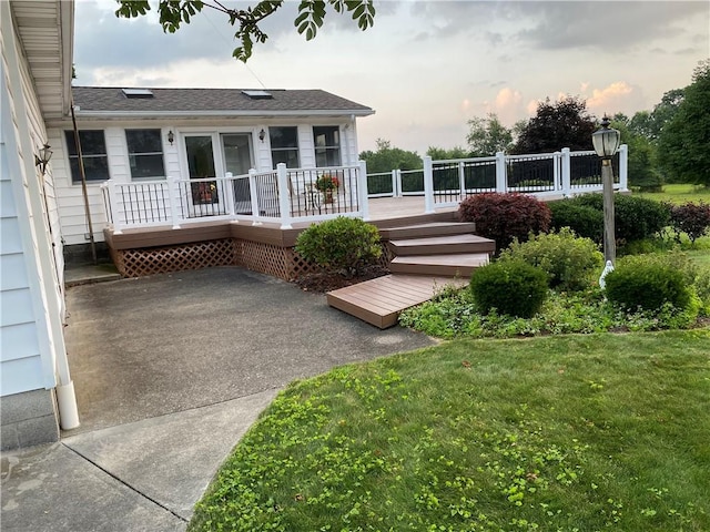 39 Hogue Rd, West Middlesex Boro, PA 16159 - back of house featuring a deck, a yard, and a shingled roof