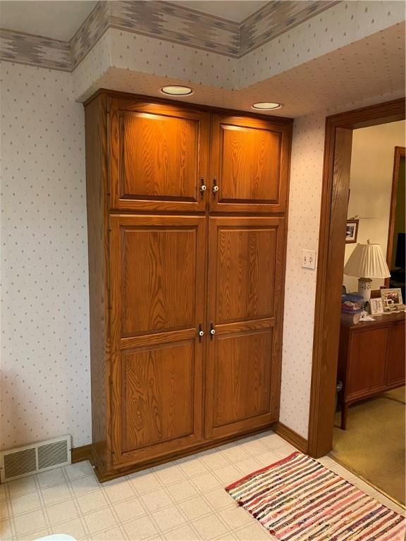 39 Hogue Rd, West Middlesex Boro, PA 16159 - detailed view of wallpapered walls and tile patterned floors