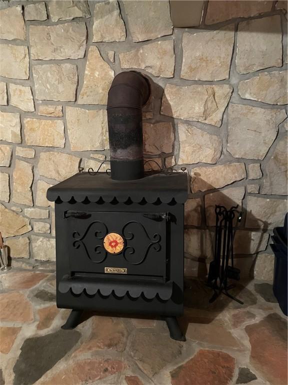 39 Hogue Rd, West Middlesex Boro, PA 16159 - detailed view of a wood stove