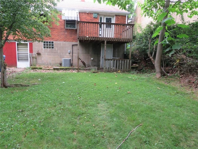 150 Marshall Dr, Penn Hills, PA 15235 - back of house with a wooden deck, brick siding, and a lawn