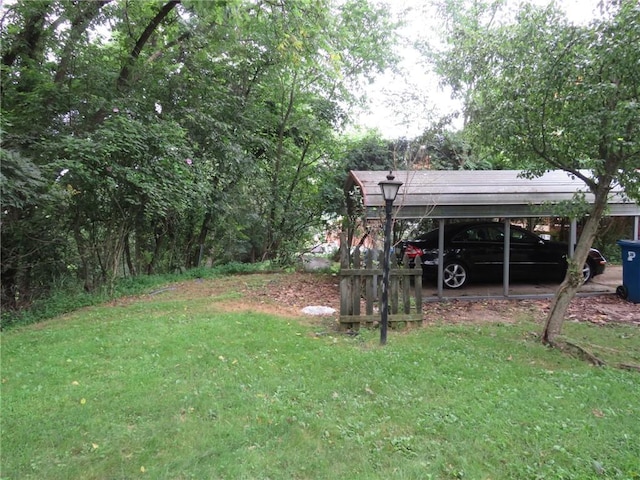 150 Marshall Dr, Penn Hills, PA 15235 - view of green lawn with a detached carport