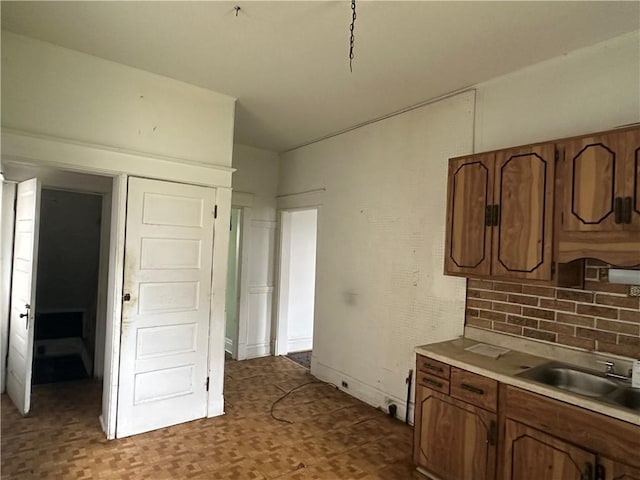1532 Orangewood Ave, Beechview, PA 15216 - kitchen featuring brown cabinetry, light countertops, and wood finished floors