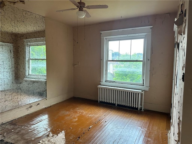 1532 Orangewood Ave, Beechview, PA 15216 - spare room with radiator heating unit, wood-type flooring, and ceiling fan