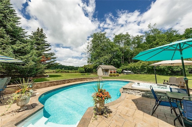 652 Cheyenne Trl, Jackson Twp, PA 16137 - swimming pool featuring a patio area, a lawn, an outdoor structure, and view of scattered trees