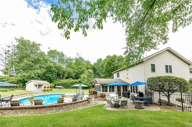 652 Cheyenne Trl, Jackson Twp, PA 16137 - back of property with a patio area and an outdoor structure