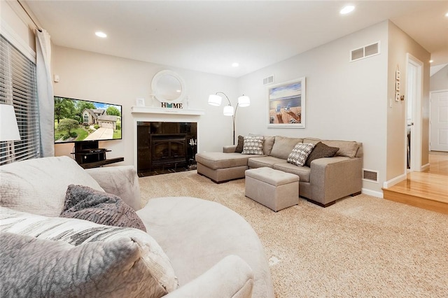 652 Cheyenne Trl, Jackson Twp, PA 16137 - living area with recessed lighting, carpet, and a tiled fireplace
