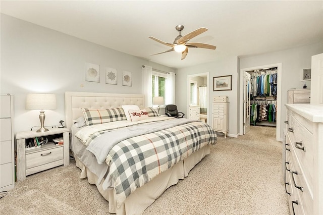 652 Cheyenne Trl, Jackson Twp, PA 16137 - bedroom with a spacious closet, light carpet, ensuite bath, and a ceiling fan