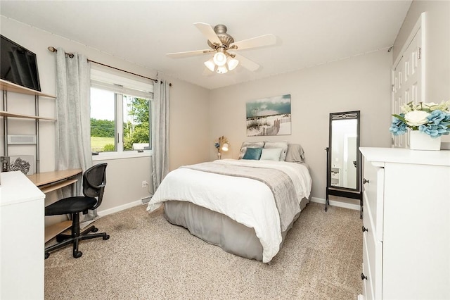 652 Cheyenne Trl, Jackson Twp, PA 16137 - bedroom featuring an office area, light carpet, and ceiling fan