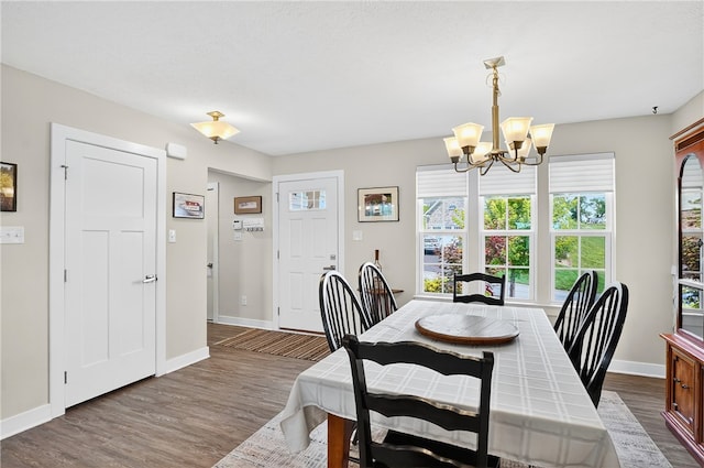 106 High Pointe Dr, Chartiers, PA 15301 - dining space featuring a chandelier and dark wood-style floors