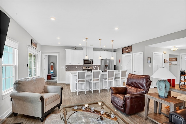 106 High Pointe Dr, Chartiers, PA 15301 - living area featuring light wood finished floors and recessed lighting