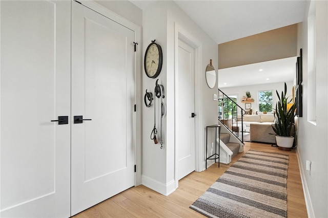 1206 Carla Dr, Blawnox, PA 15238 - entrance foyer featuring light wood-style flooring, stairs, and recessed lighting