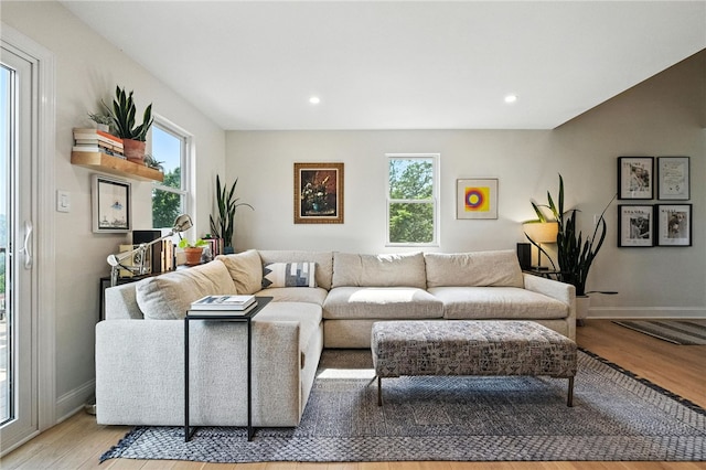 1206 Carla Dr, Blawnox, PA 15238 - living area featuring wood finished floors and recessed lighting