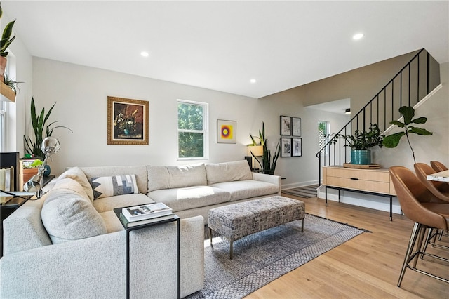1206 Carla Dr, Blawnox, PA 15238 - living area with light wood-style flooring, stairway, and recessed lighting