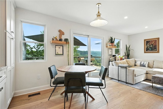 1206 Carla Dr, Blawnox, PA 15238 - dining room featuring light wood-style floors and recessed lighting