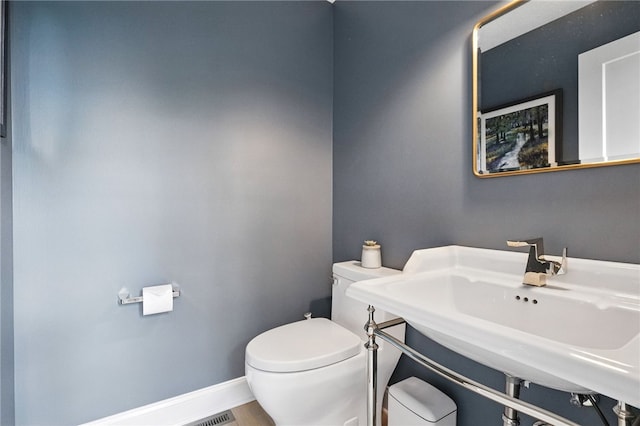 1206 Carla Dr, Blawnox, PA 15238 - bathroom with toilet and baseboards