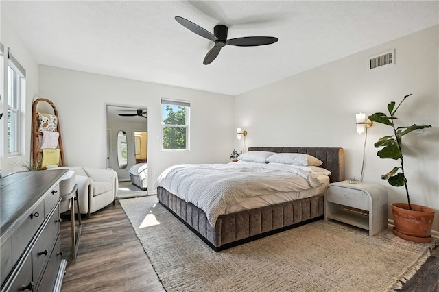 1206 Carla Dr, Blawnox, PA 15238 - bedroom featuring dark wood-style flooring and ceiling fan