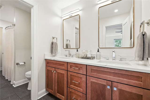 1206 Carla Dr, Blawnox, PA 15238 - bathroom featuring double vanity and tile patterned flooring