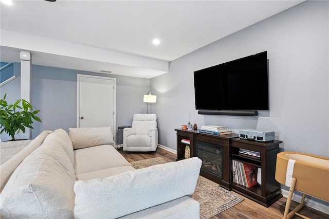 1206 Carla Dr, Blawnox, PA 15238 - living room featuring wood finished floors and recessed lighting