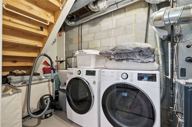 1206 Carla Dr, Blawnox, PA 15238 - washroom featuring separate washer and dryer and concrete block wall