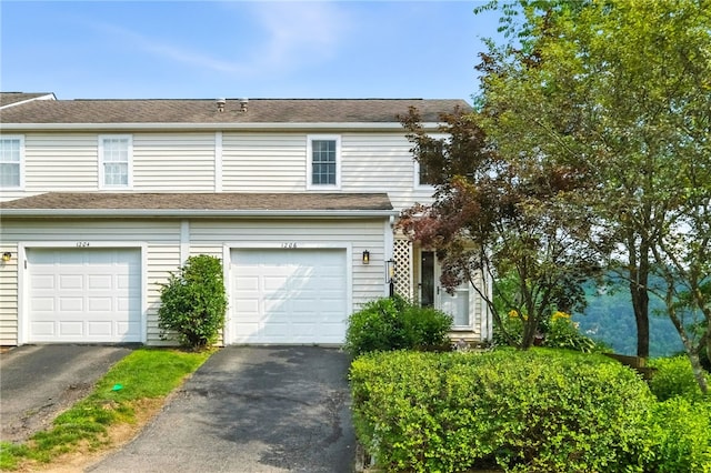 1206 Carla Dr, Blawnox, PA 15238 - traditional-style home featuring driveway and an attached garage
