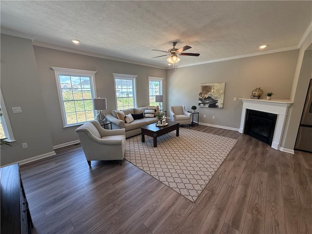 173 Lockheed Dr, Moon/Crescent Twp, PA 15108 - living area with a ceiling fan, dark wood-type flooring, a textured ceiling, ornamental molding, and a fireplace