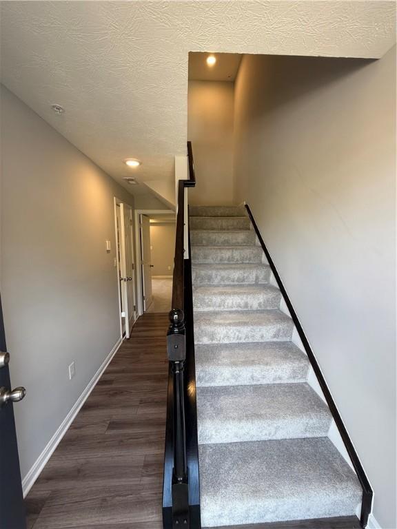 173 Lockheed Dr, Moon/Crescent Twp, PA 15108 - stairs with wood finished floors, recessed lighting, and a textured ceiling