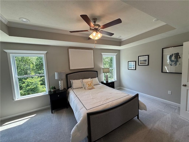 173 Lockheed Dr, Moon/Crescent Twp, PA 15108 - bedroom featuring ornamental molding, carpet flooring, a tray ceiling, and a ceiling fan