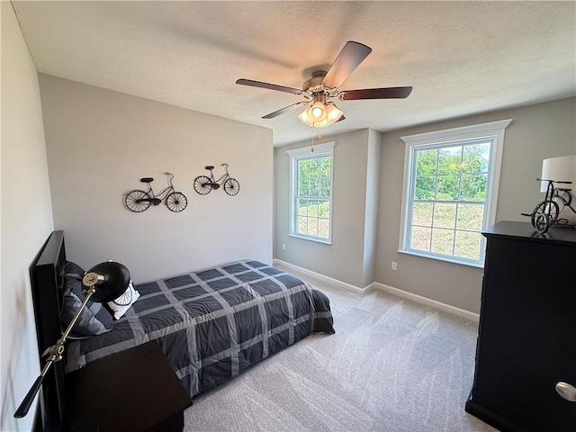 173 Lockheed Dr, Moon/Crescent Twp, PA 15108 - carpeted bedroom with a textured ceiling and ceiling fan
