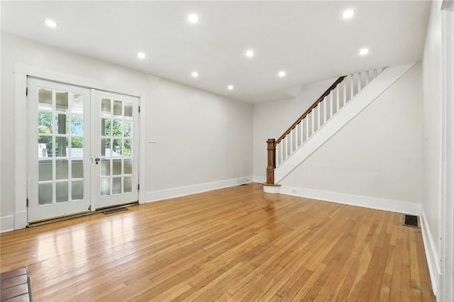 5248 Beelermont Pl, Squirrel Hill, PA 15217 - unfurnished living room featuring light wood finished floors, stairs, and recessed lighting