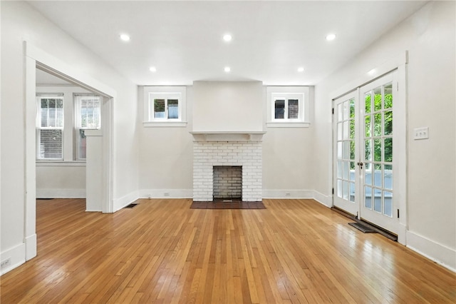 5248 Beelermont Pl, Squirrel Hill, PA 15217 - unfurnished living room with light wood-style floors, a fireplace, and recessed lighting
