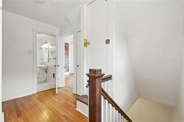 5248 Beelermont Pl, Squirrel Hill, PA 15217 - hallway with an upstairs landing and light wood-style floors
