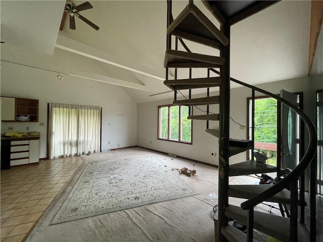 262 Twin Bridges Rd, Charleroi Boro, PA 15022 - unfurnished living room with ceiling fan, high vaulted ceiling, tile patterned floors, and stairs