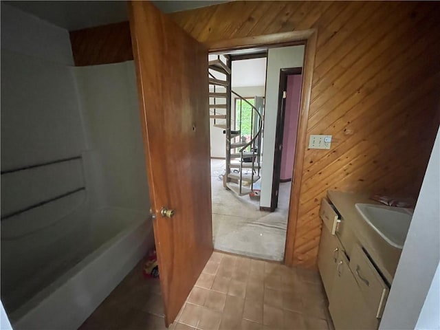 262 Twin Bridges Rd, Charleroi Boro, PA 15022 - full bath featuring vanity, wood walls, shower / washtub combination, and tile patterned floors