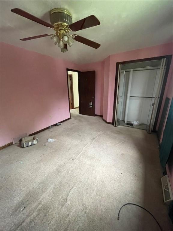 262 Twin Bridges Rd, Charleroi Boro, PA 15022 - unfurnished bedroom featuring a closet, light carpet, and ceiling fan