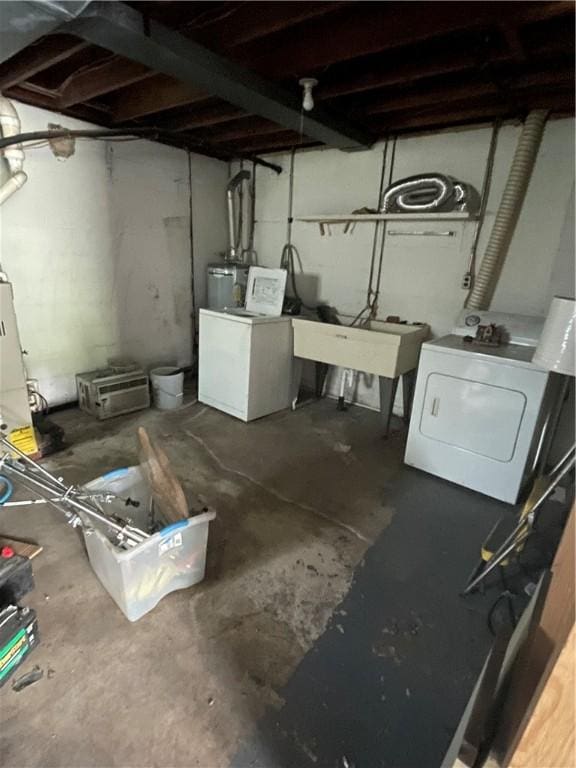262 Twin Bridges Rd, Charleroi Boro, PA 15022 - unfinished below grade area with a sink and washing machine and dryer