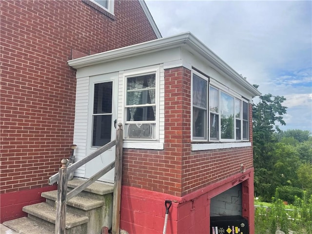 33 Orchard Ln, Carroll Twp, PA 15063 - view of home's exterior with brick siding and entry steps
