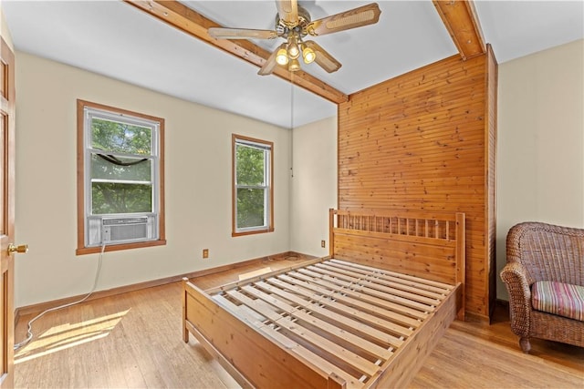 213 Pennsylvania Ave, Emsworth, PA 15202 - bedroom with wooden walls, light wood finished floors, beam ceiling, and a ceiling fan