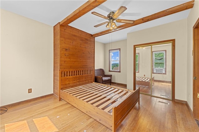 213 Pennsylvania Ave, Emsworth, PA 15202 - bedroom featuring beam ceiling, hardwood / wood-style flooring, ceiling fan, and a closet