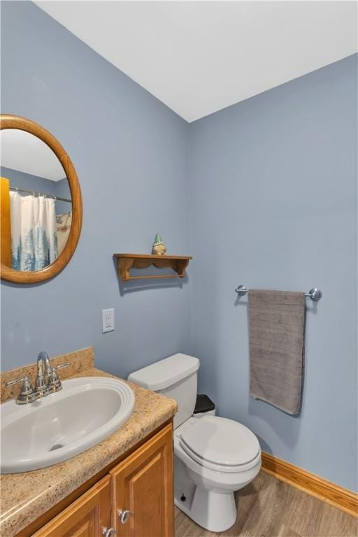 115 Barrett Dr, Brighton Twp, PA 15009 - full bathroom with wood finished floors, vanity, and curtained shower