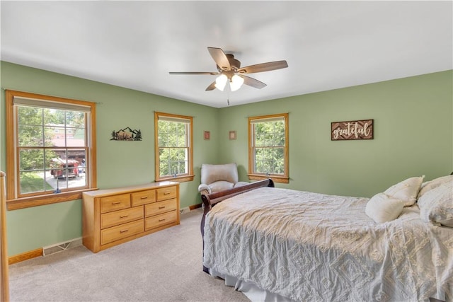 115 Barrett Dr, Brighton Twp, PA 15009 - bedroom featuring multiple windows, light colored carpet, and ceiling fan