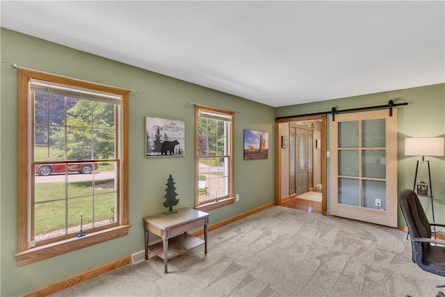 115 Barrett Dr, Brighton Twp, PA 15009 - carpeted home office with baseboards and a barn door